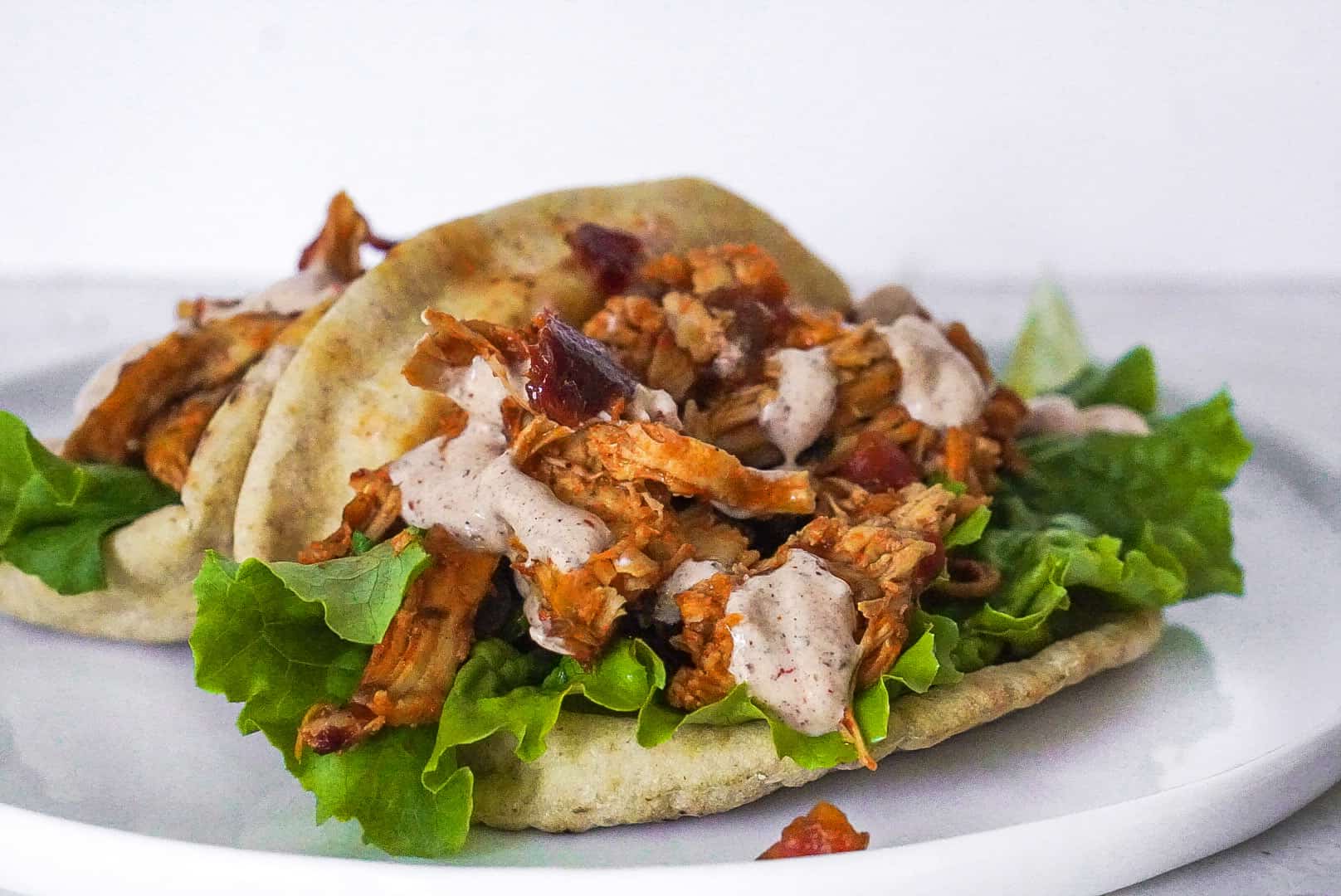 Spicy Chicken Adobo Pitas with Chili Lime Crema