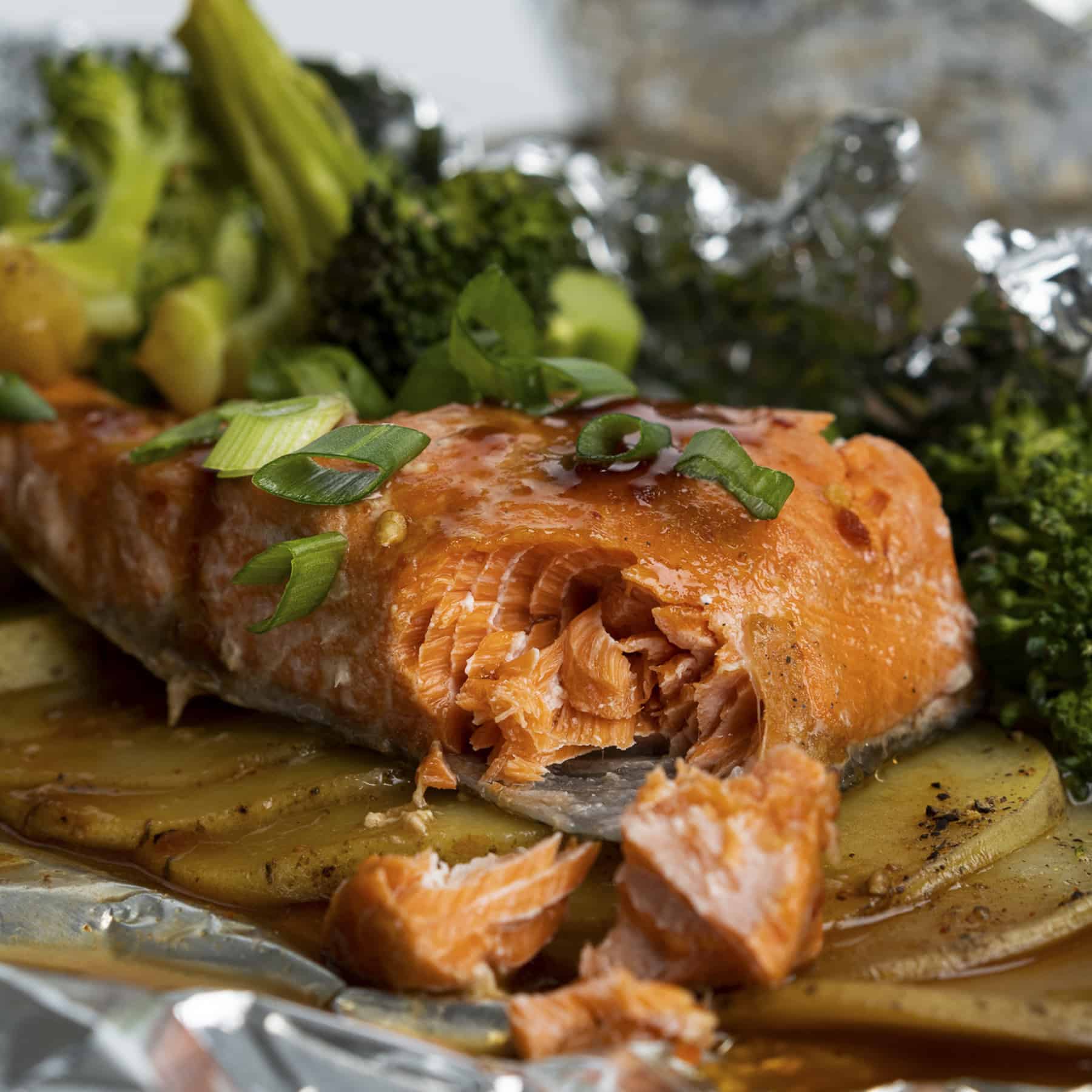Single Serving Baked Salmon Foil Pack with Sliced Potatoes and Broccoli