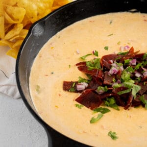 Queso in a cast iron skillet.