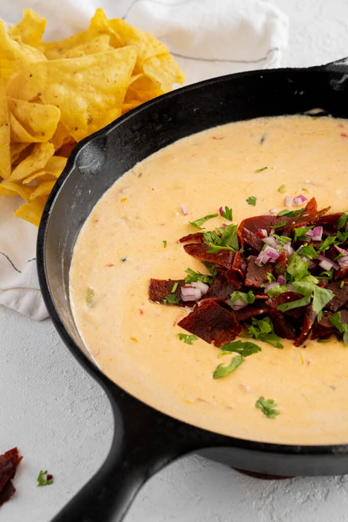 Queso in a cast iron skillet.