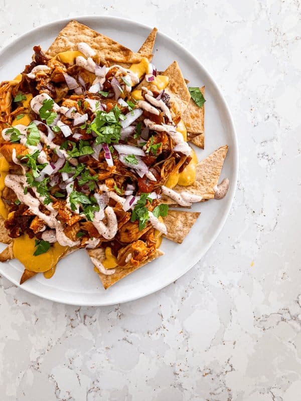 Plate of chicken adobo nachos.