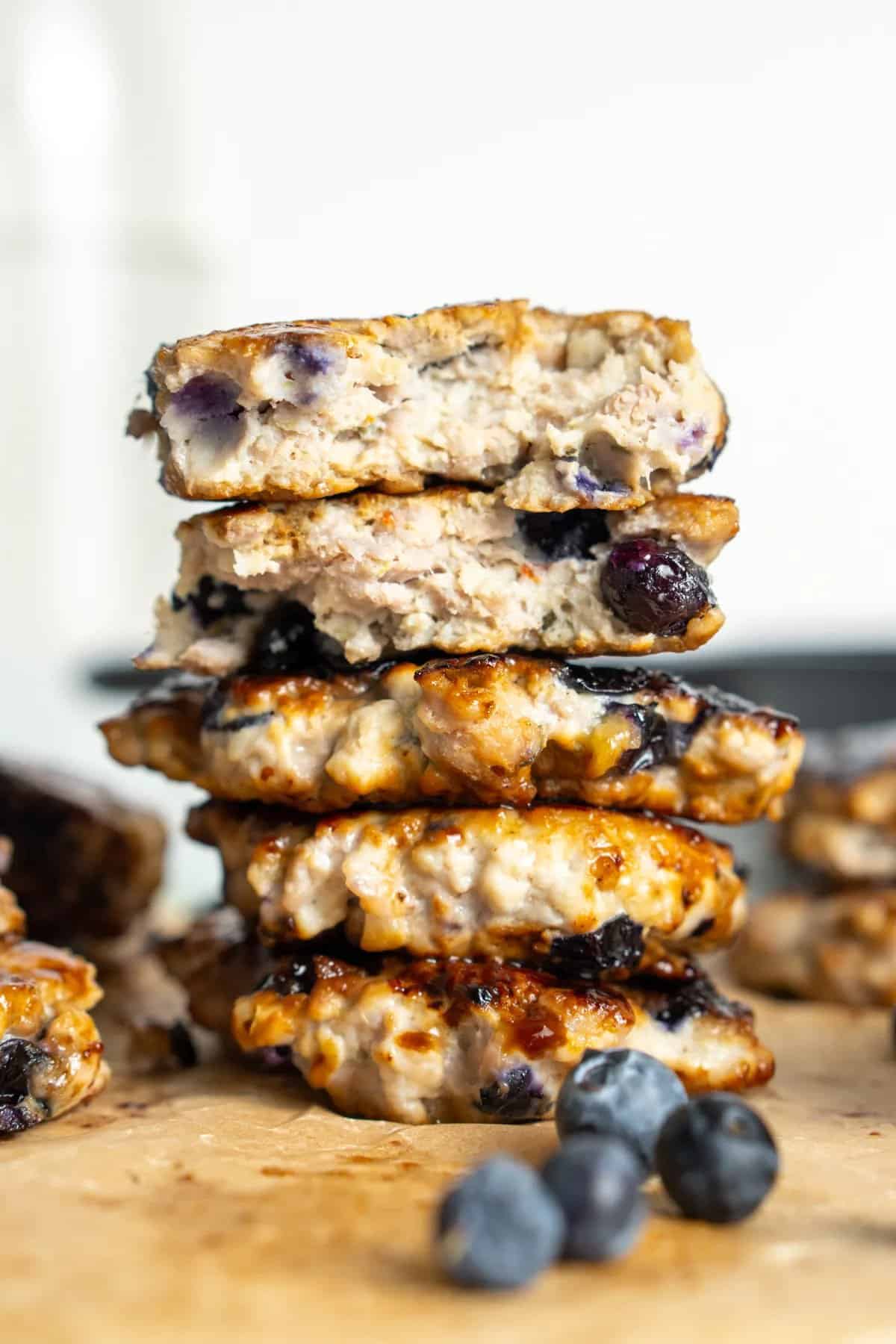 Tall stack of blueberry breakfast sausage.