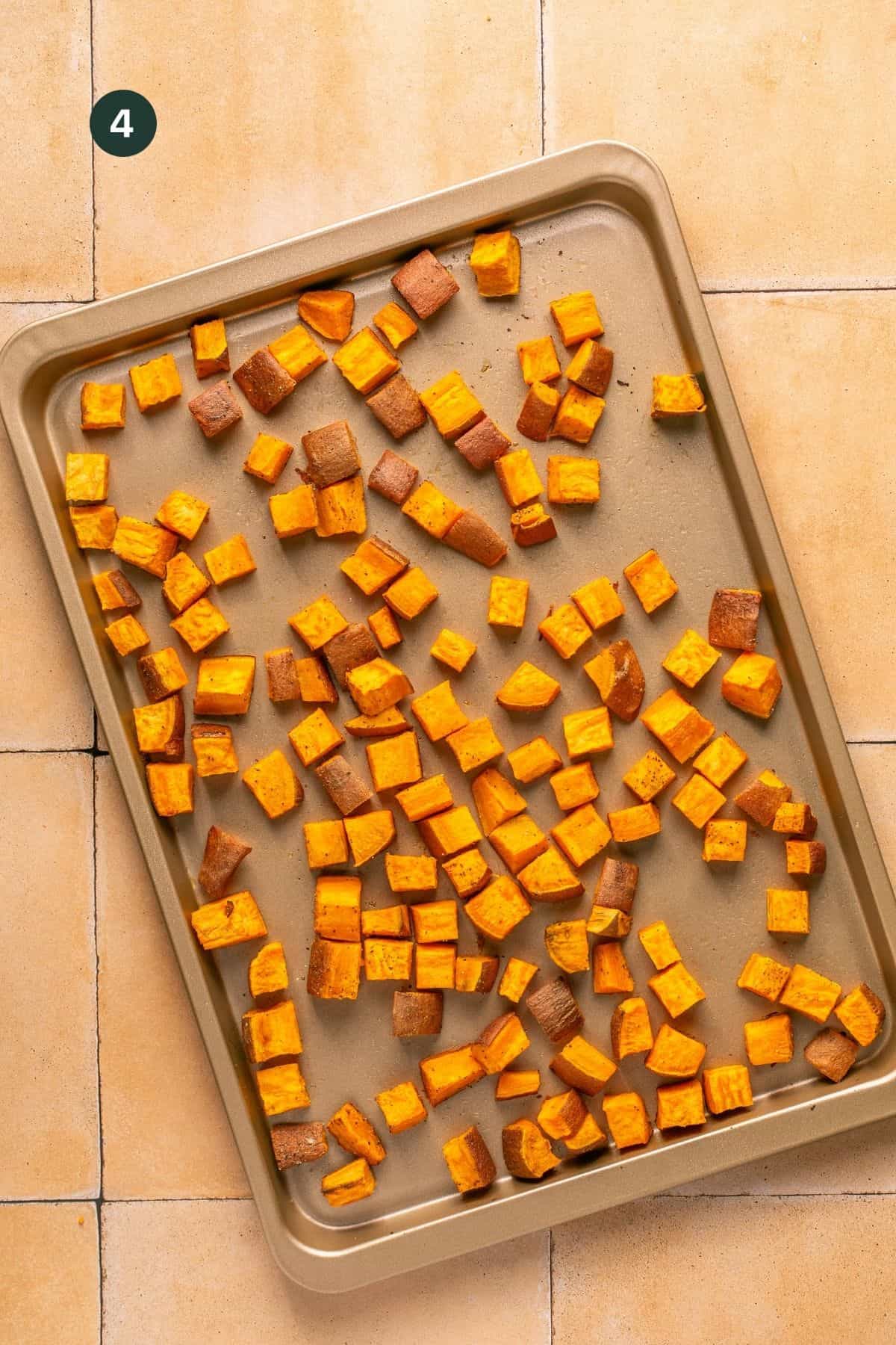 Roasted sweet potatoes on a baking sheet. 