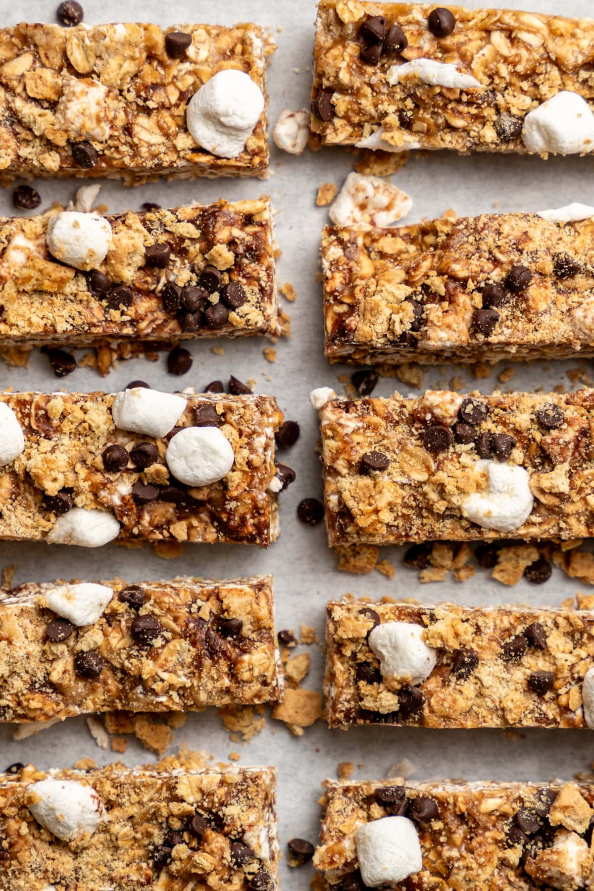 Homemade s'mores chewy bars on parchment paper.