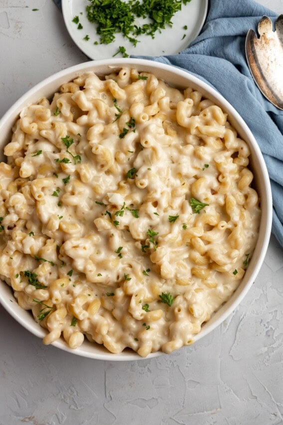 White cheddar mac and cheese in a white bowl.