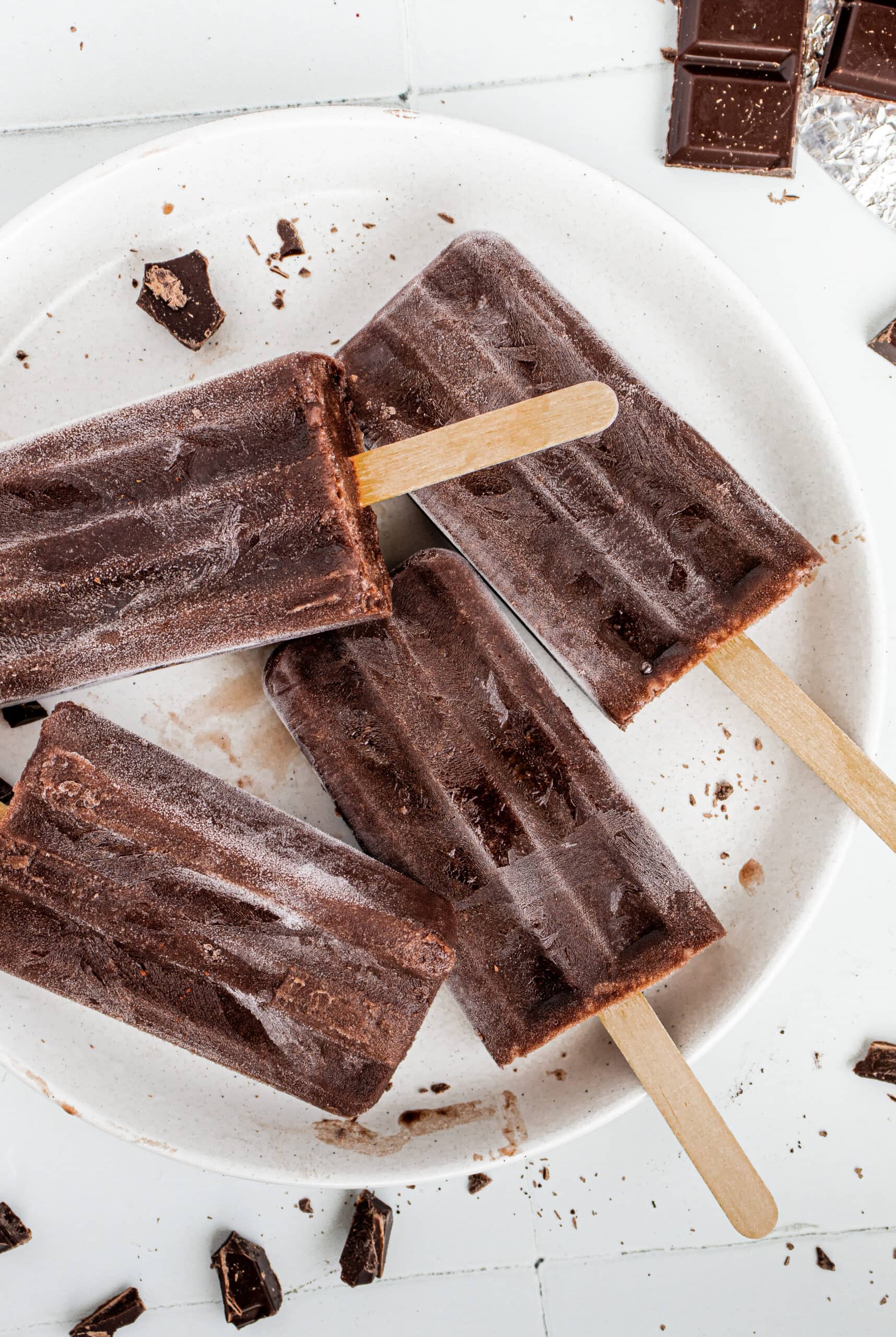 Plate with four fudgesicles.