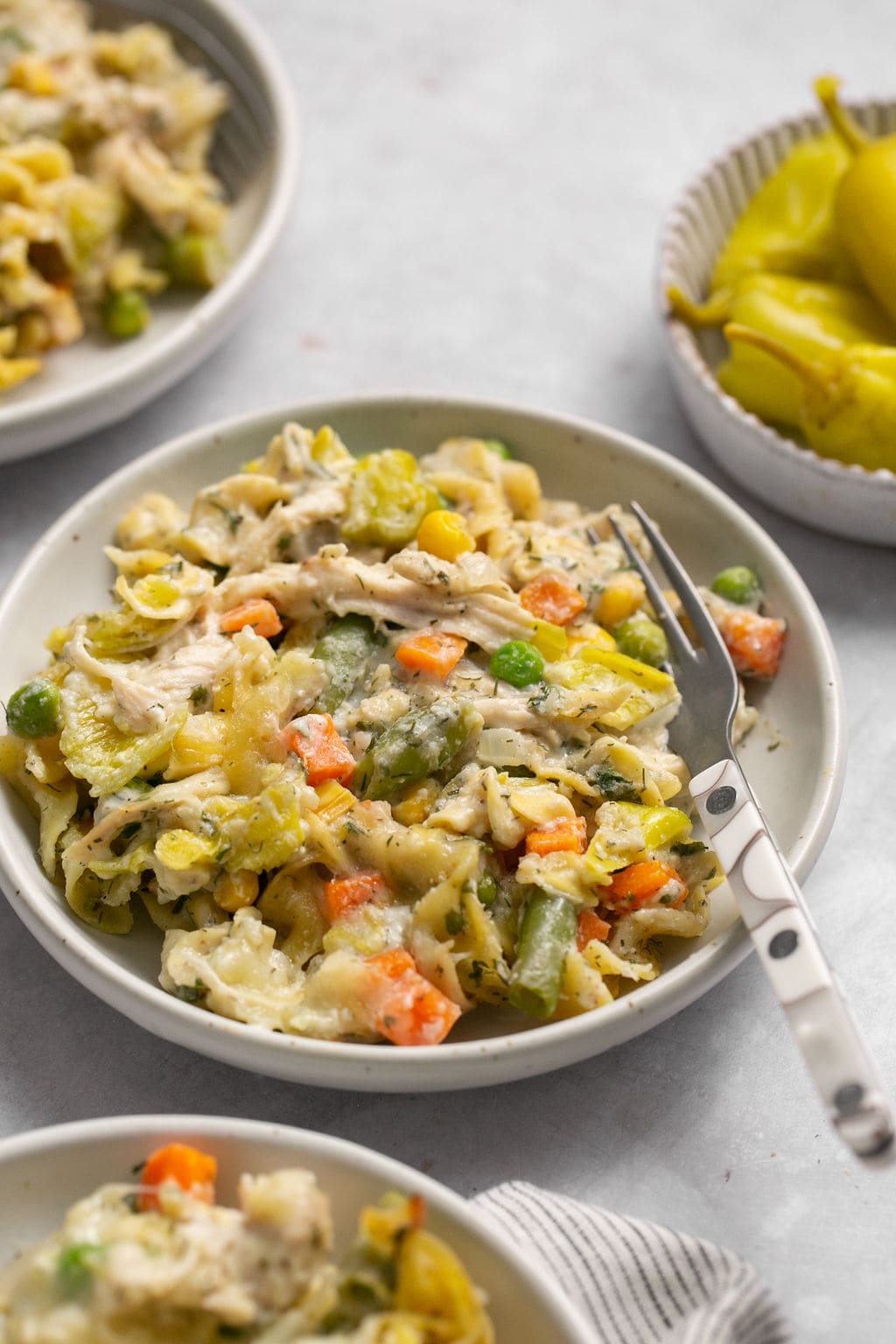 Bowl of noodles, vegetables and chicken casserole. 