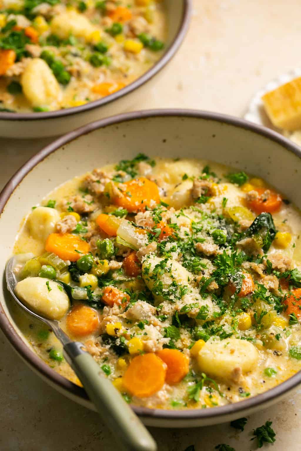 Bowls of soup with toppings. 