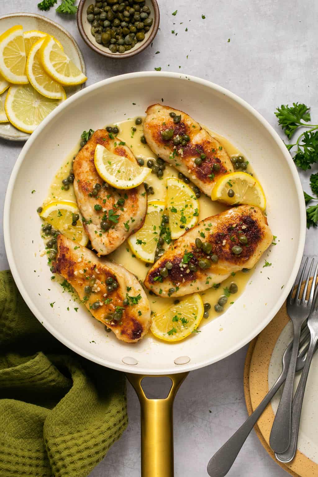 Plate of gluten free chicken piccata.