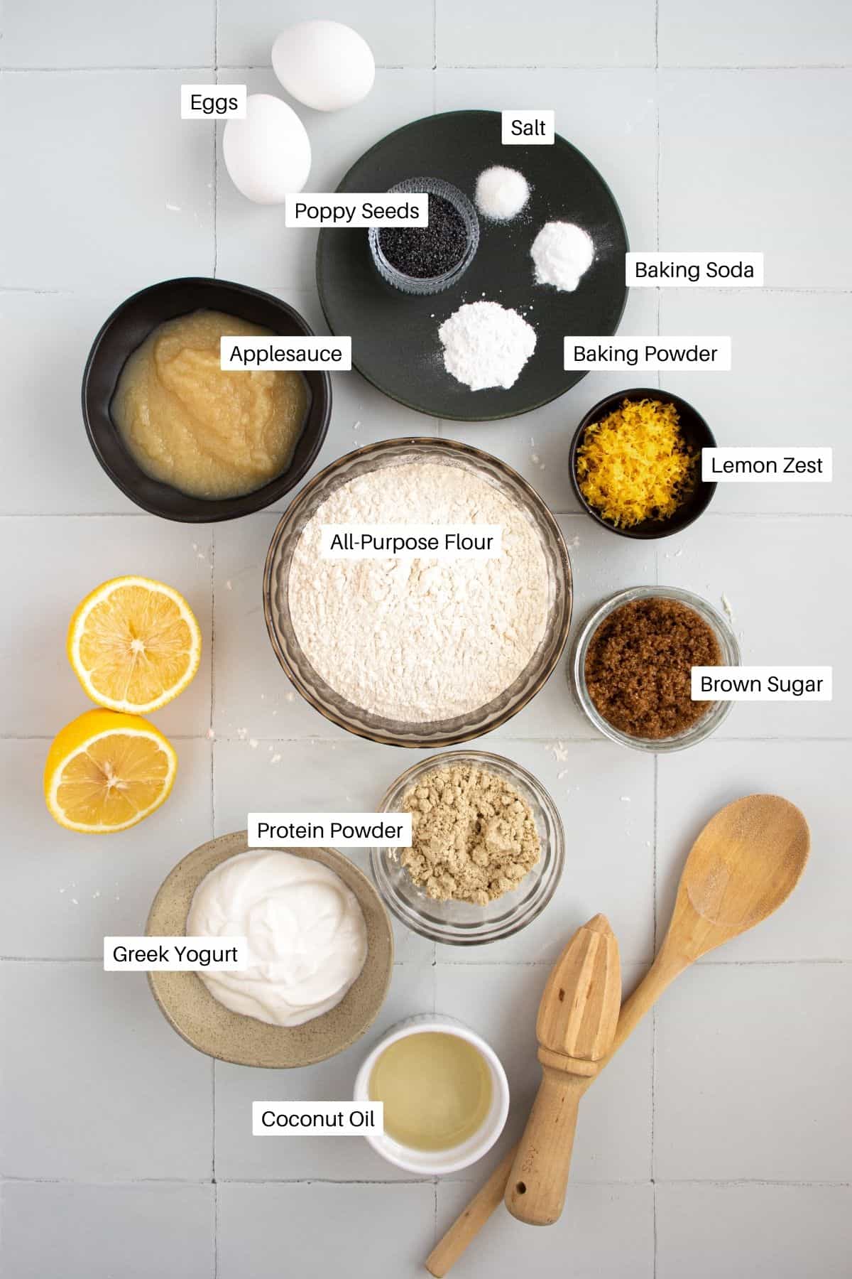 Muffin ingredients including applesauce, lemon zest, and protein powder.