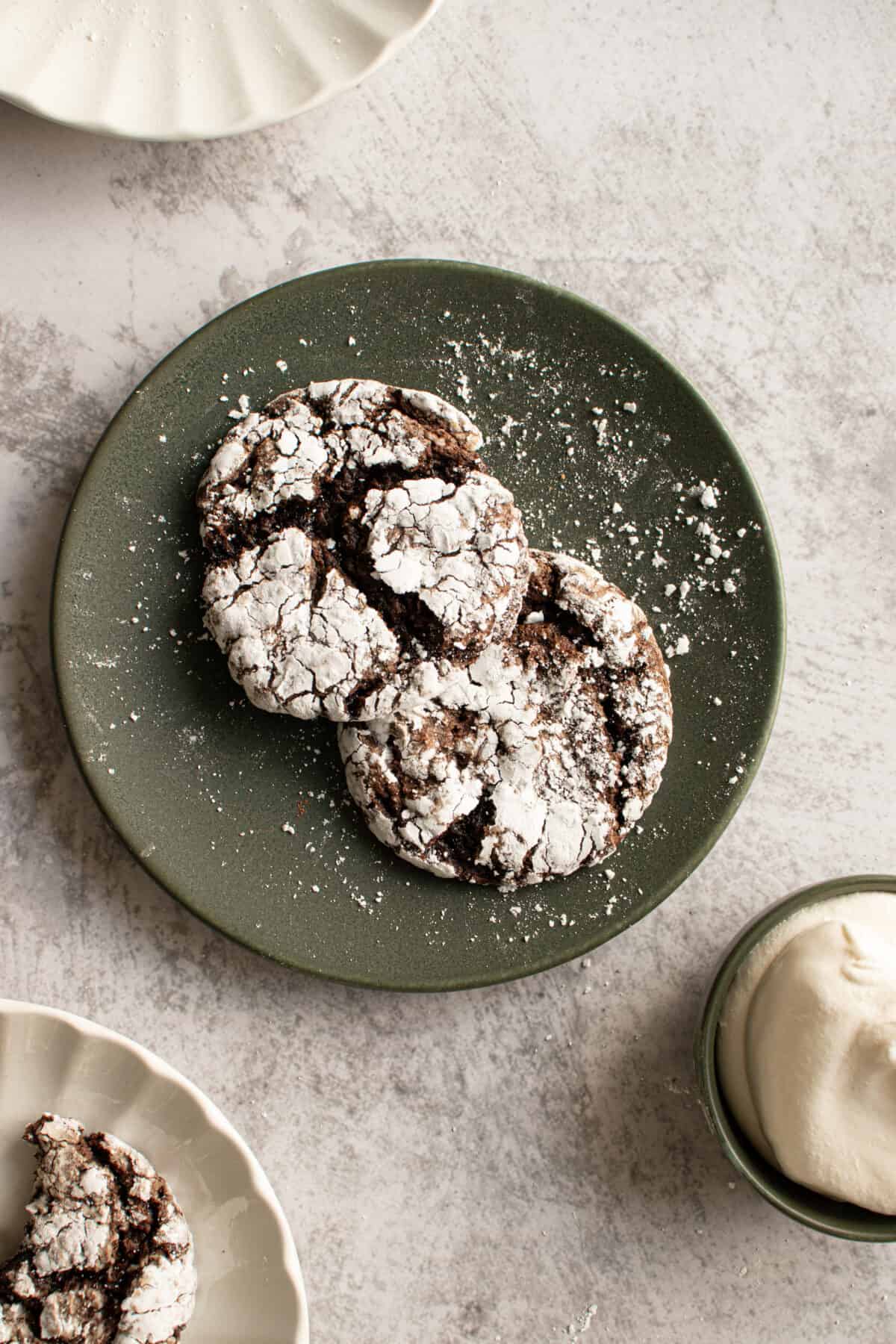 Chocolate crinkle Cool Whip cookies on a plate.