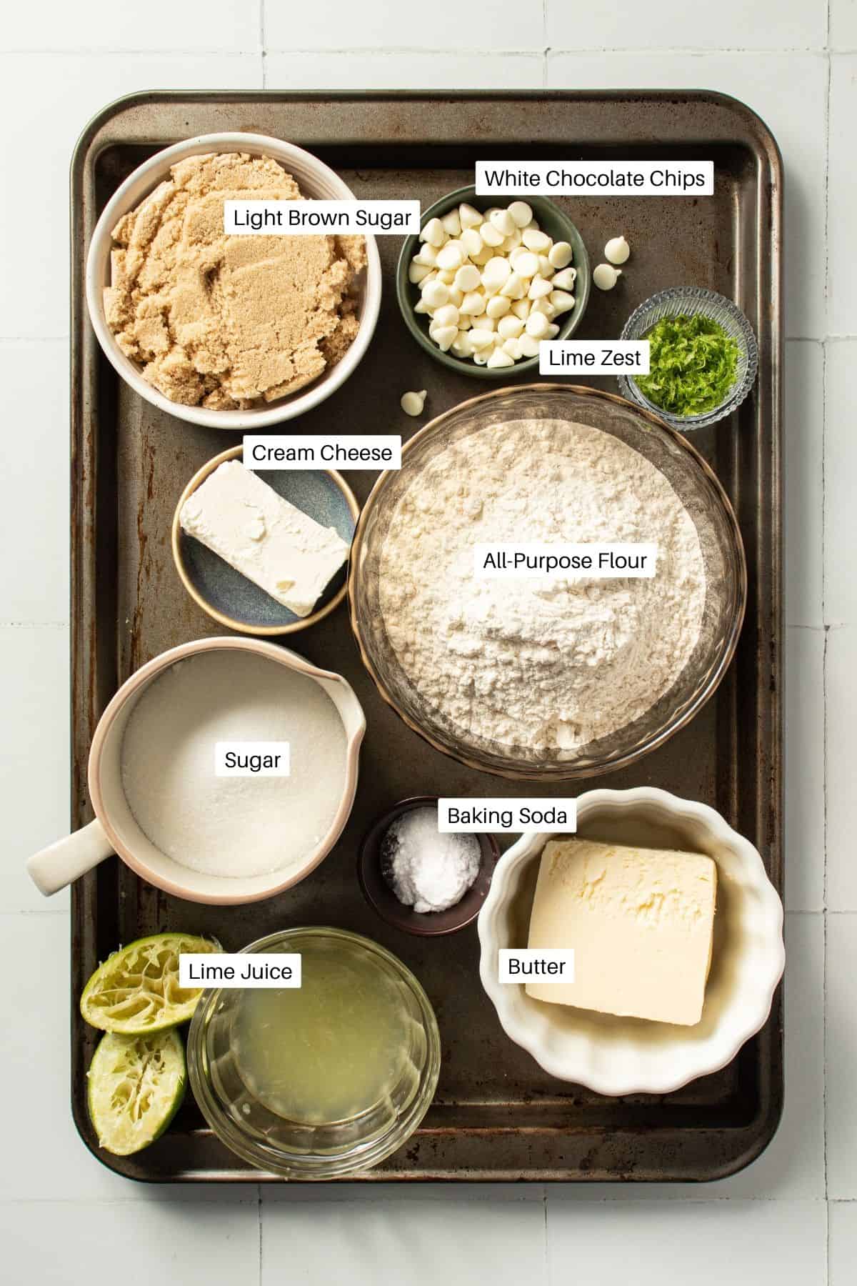 Ingredients on a tray including light brown sugar, lime juice, and cream cheese.