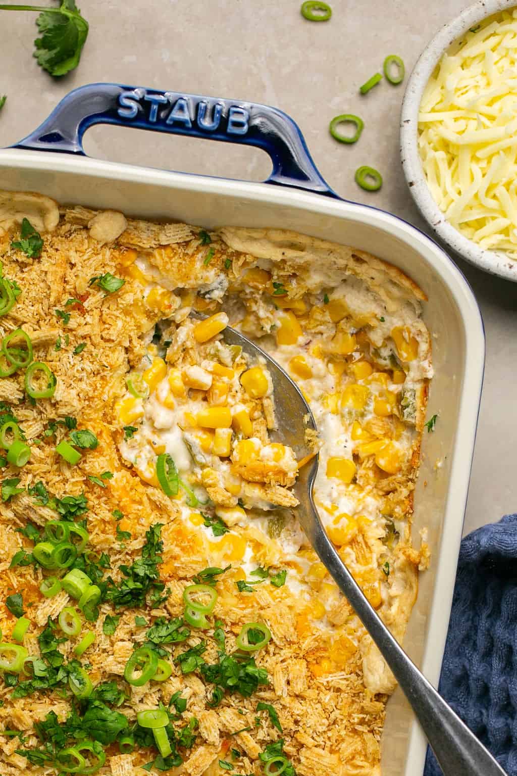 Spoon in the casserole and cheese off to the side.
