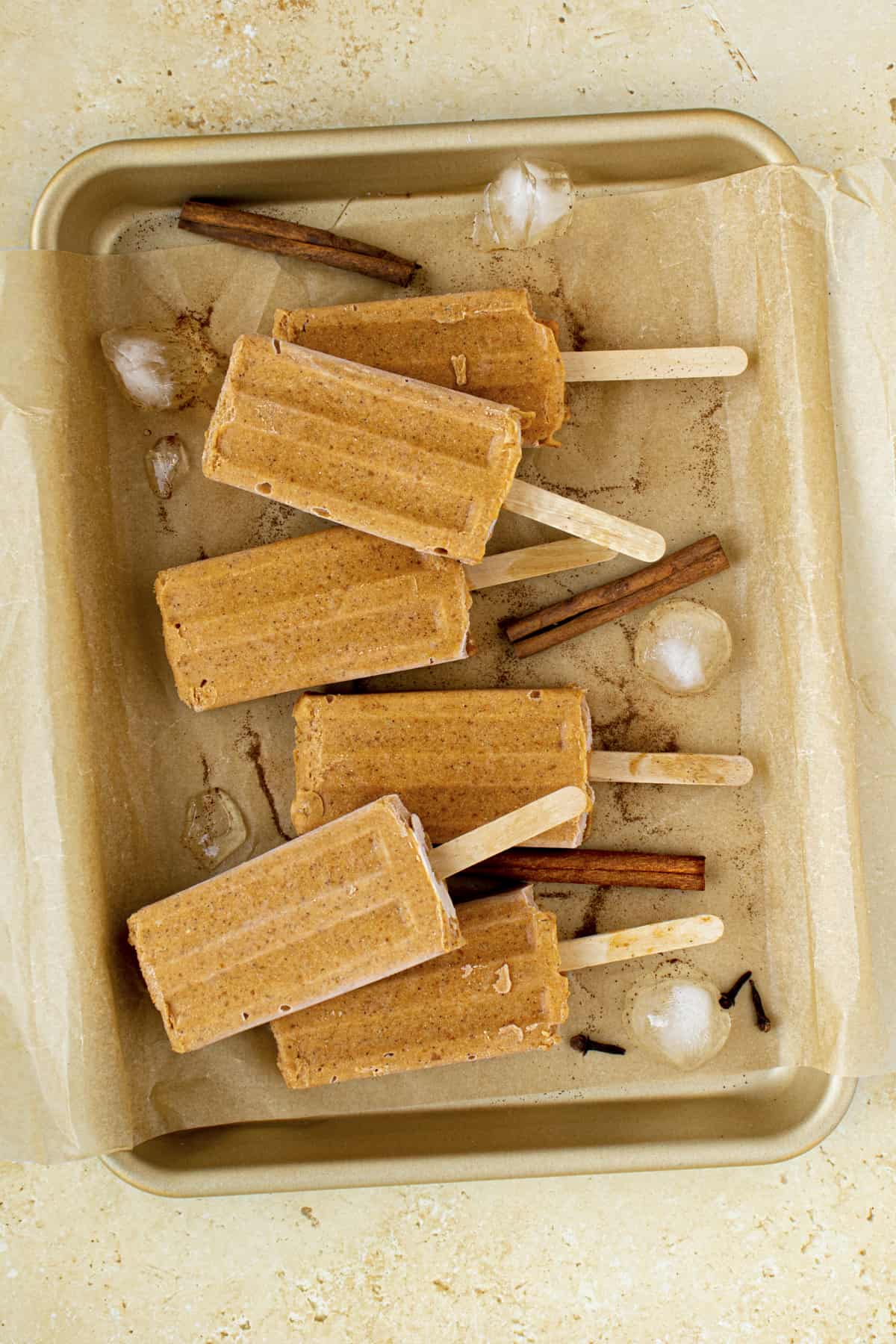 Popsicles on a baking sheet. 