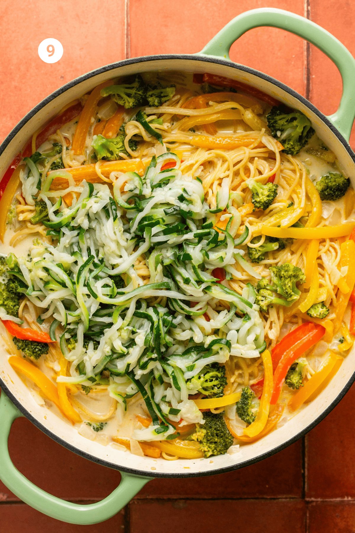 Spiralized zucchini added to the pot.
