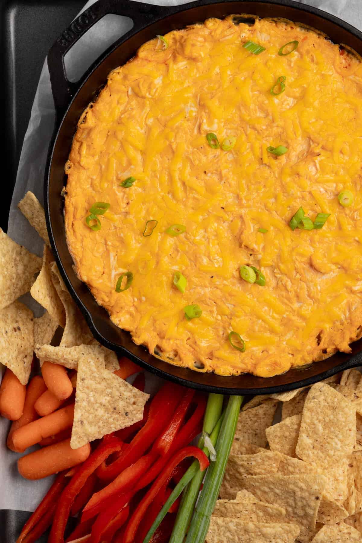 Dip in a cast iron with chips and veggies for dipping. 