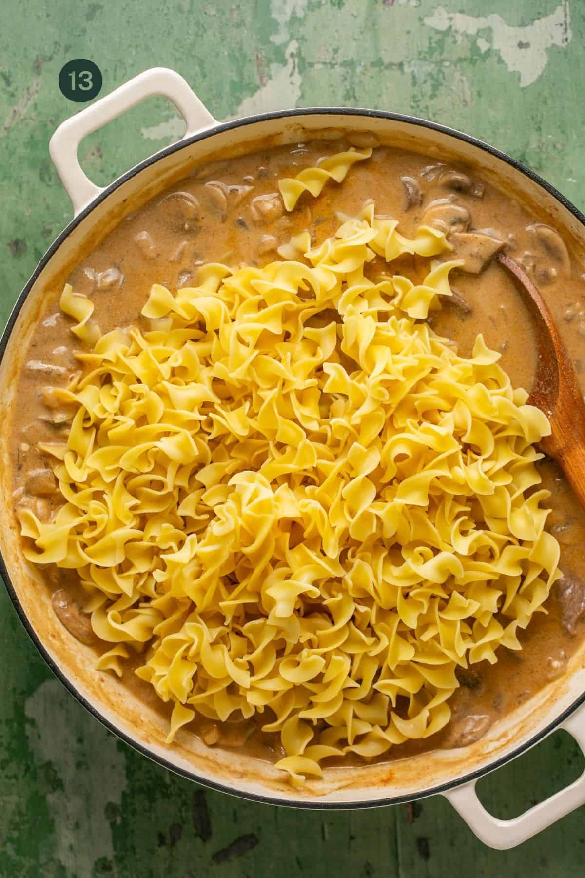 Cooked and drained egg noodles added to the creamy sauce. 