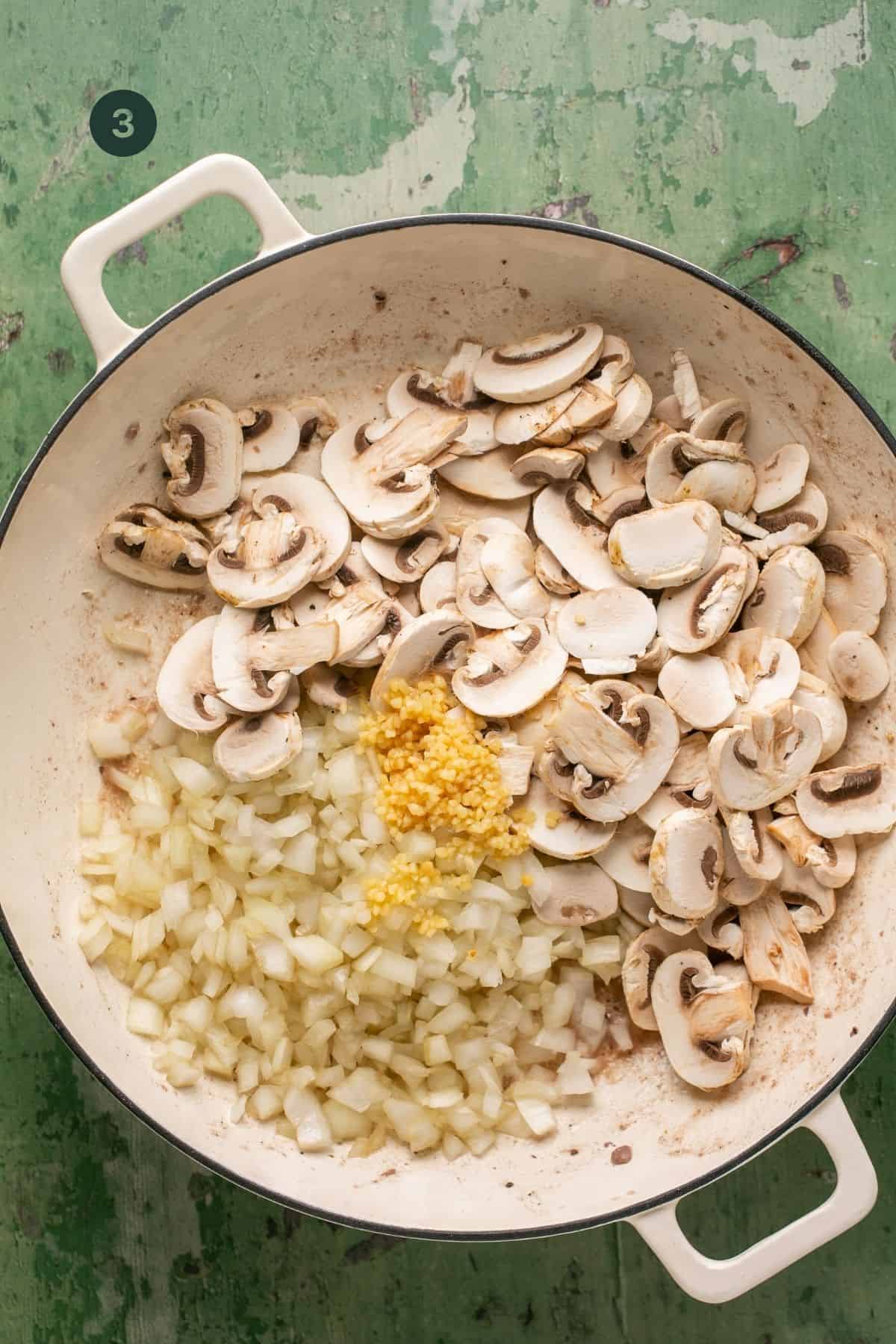 Mushrooms, garlic and onion added to the pan without the beef. 