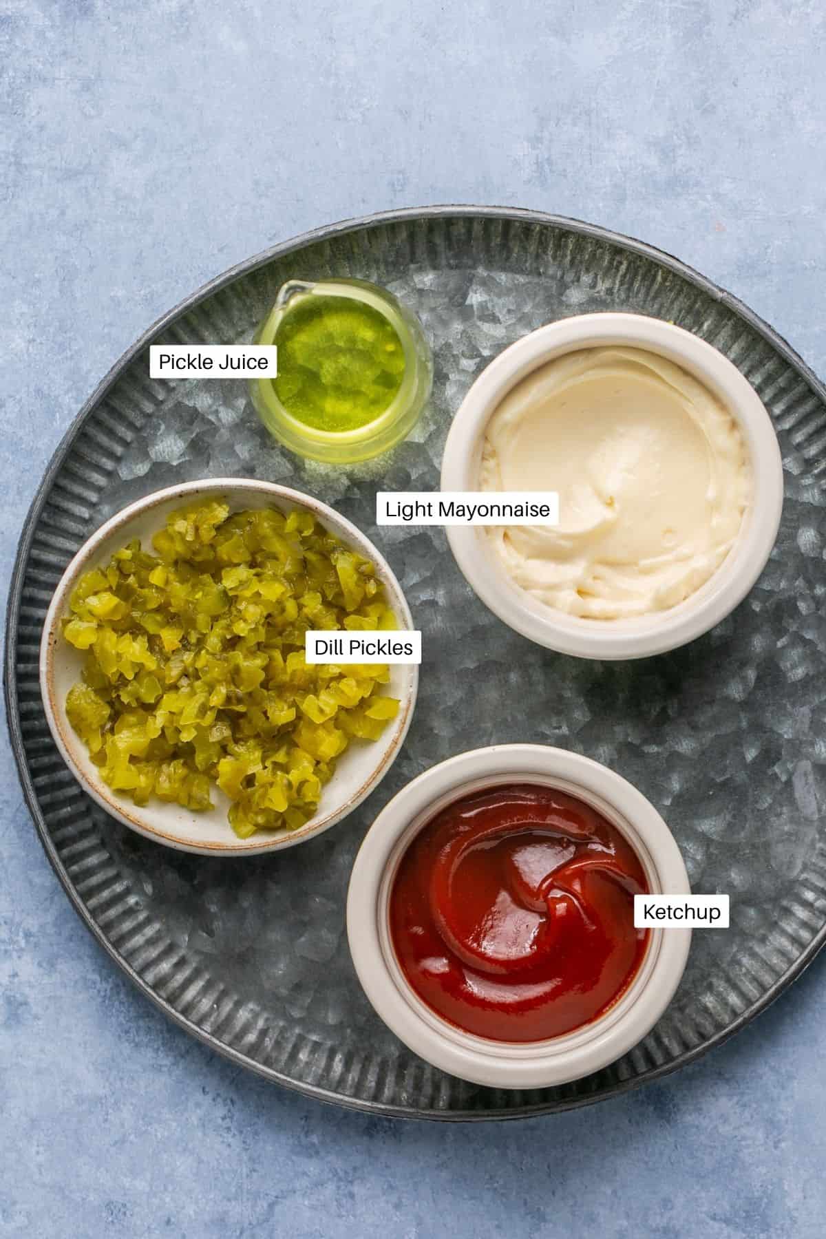 Mayonnaise, ketchup, chopped pickles and pickle juice for the sauce. 