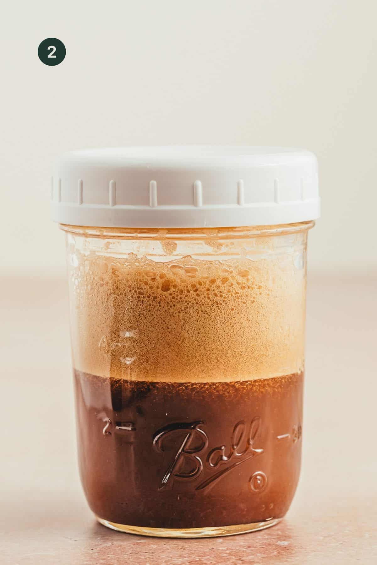 Shaken coffee base with foam on top. 