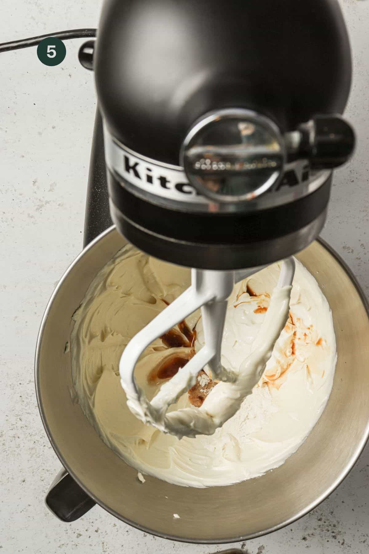 Extracts, flour and greek yogurt added to the mixer.