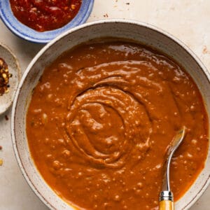 Fully mixed peanut sauce in a small bowl.