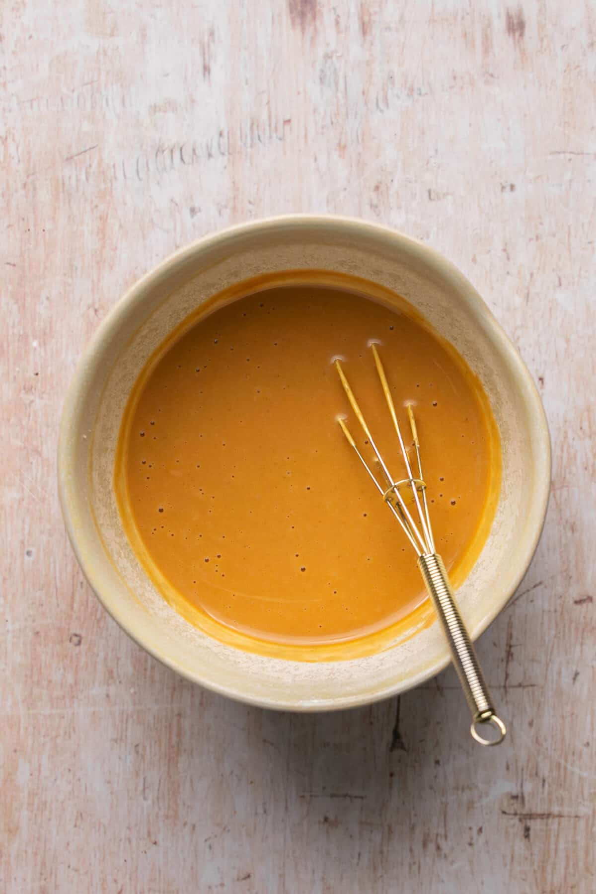 Peanut butter sauce in a small bowl.