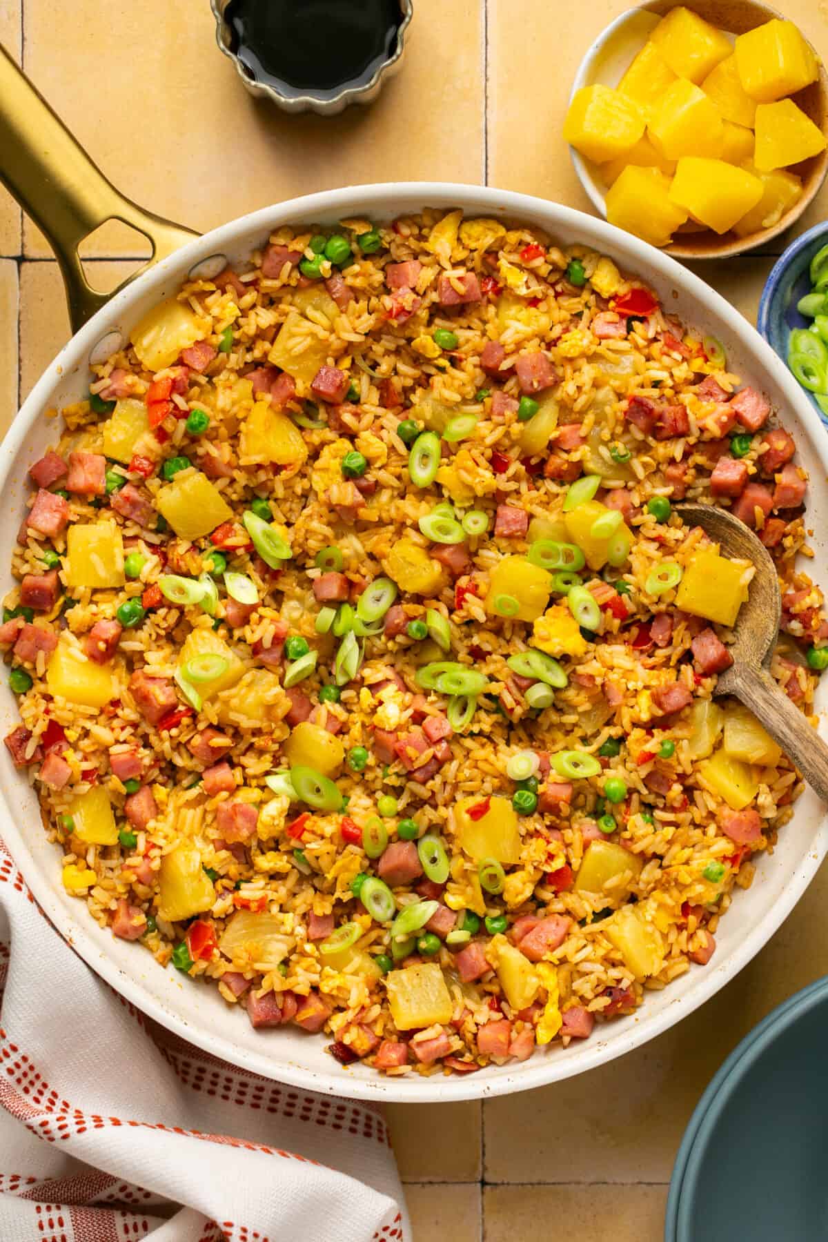 Ham and pineapple fried rice in a large skillet. 