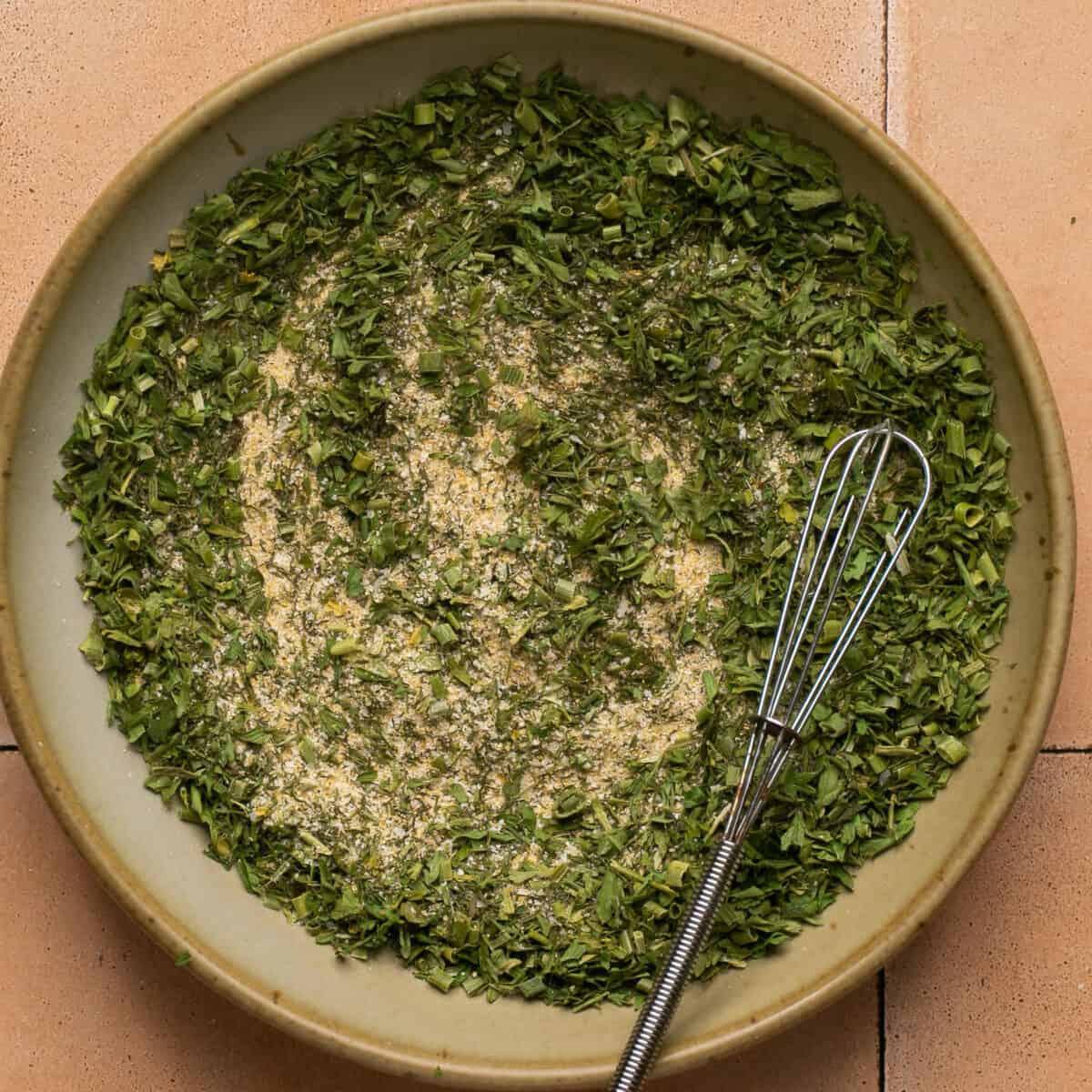 Dried parsley, salt, pepper, dill, chives, garlic powder and onion powder whisked together in a small bowl.