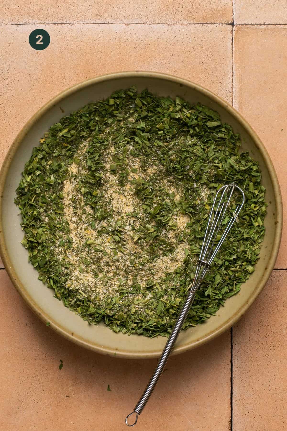 Dried parsley, salt, pepper, dill, chives, garlic powder and onion powder whisked together in a small bowl.