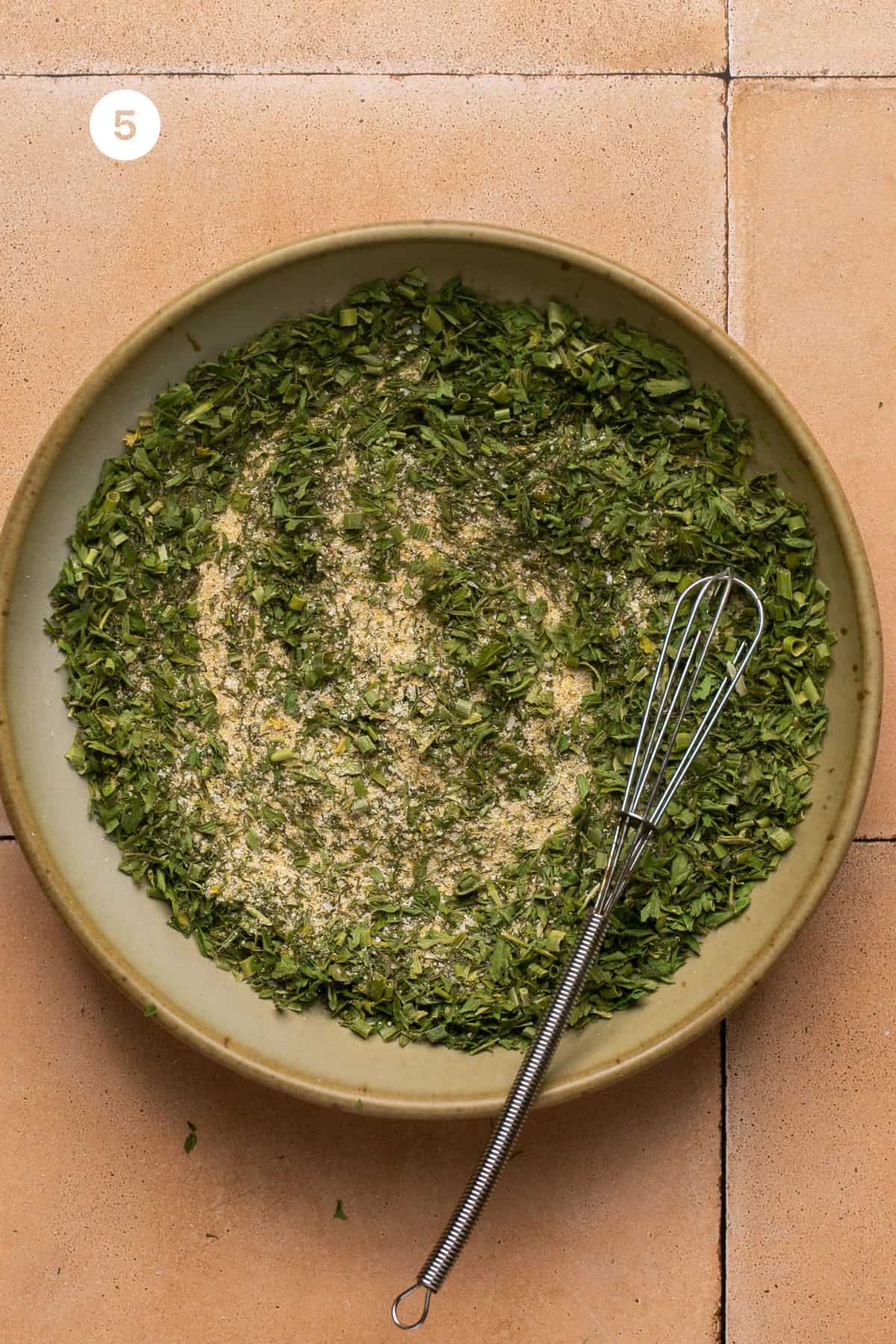 Ranch seasoning mixed in a small bowl with a whisk. 