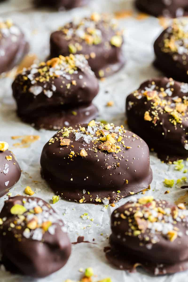Chocolate covered dates with salt and pistachios on top. 
