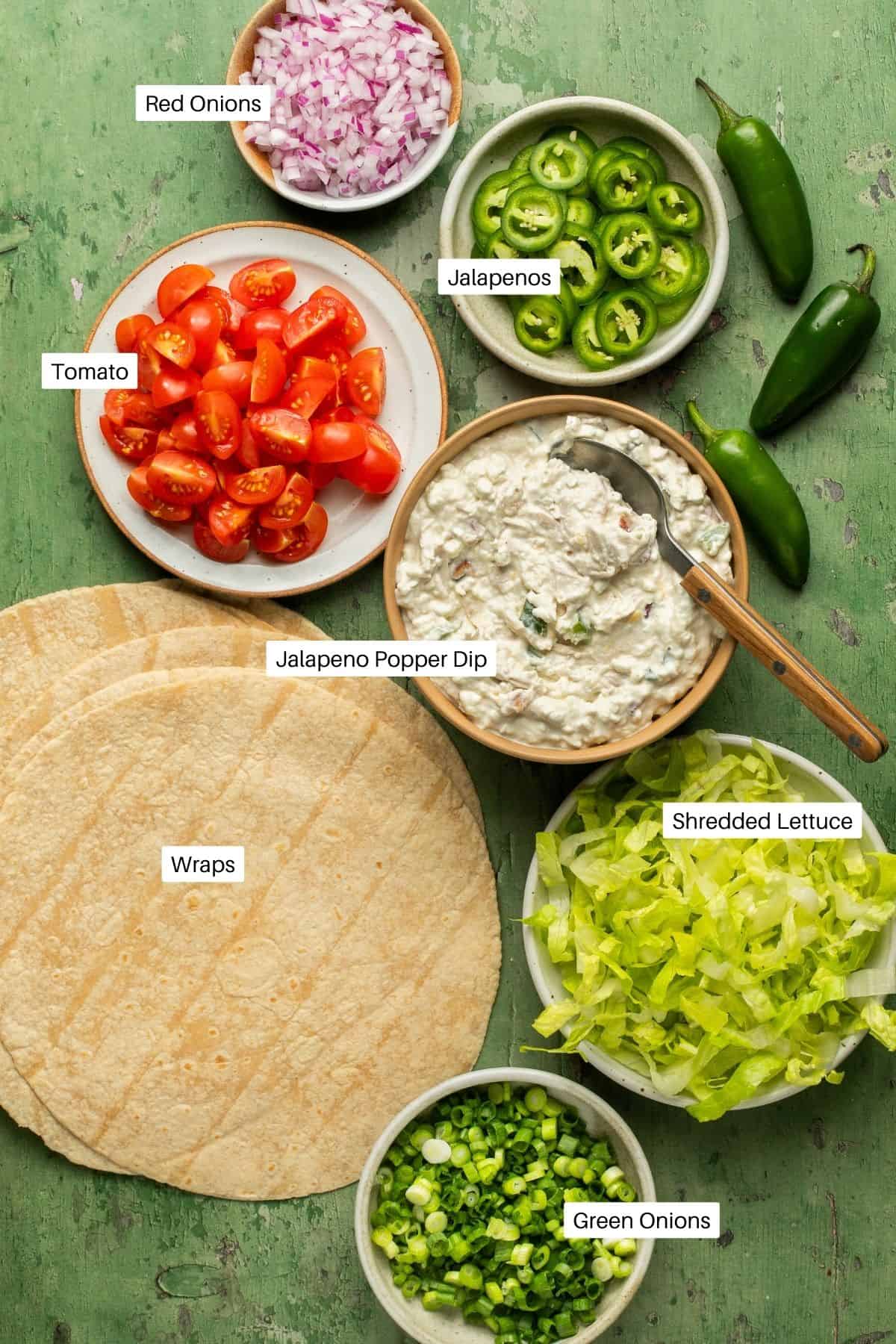 Jalapeno popper dip, wraps, red onion, jalapeno, lettuce, tomato and red onion for wraps. 