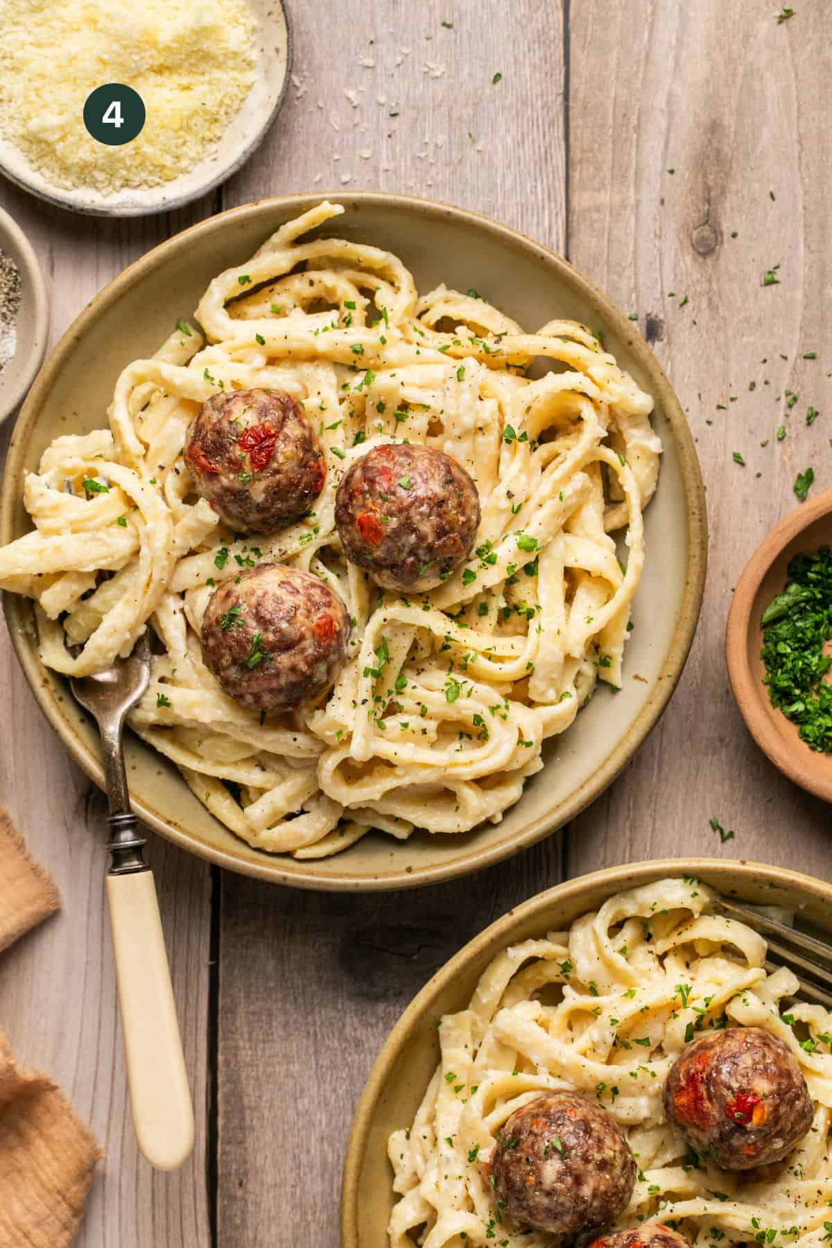 3 meatballs over instant pot fettucine alfredo. 