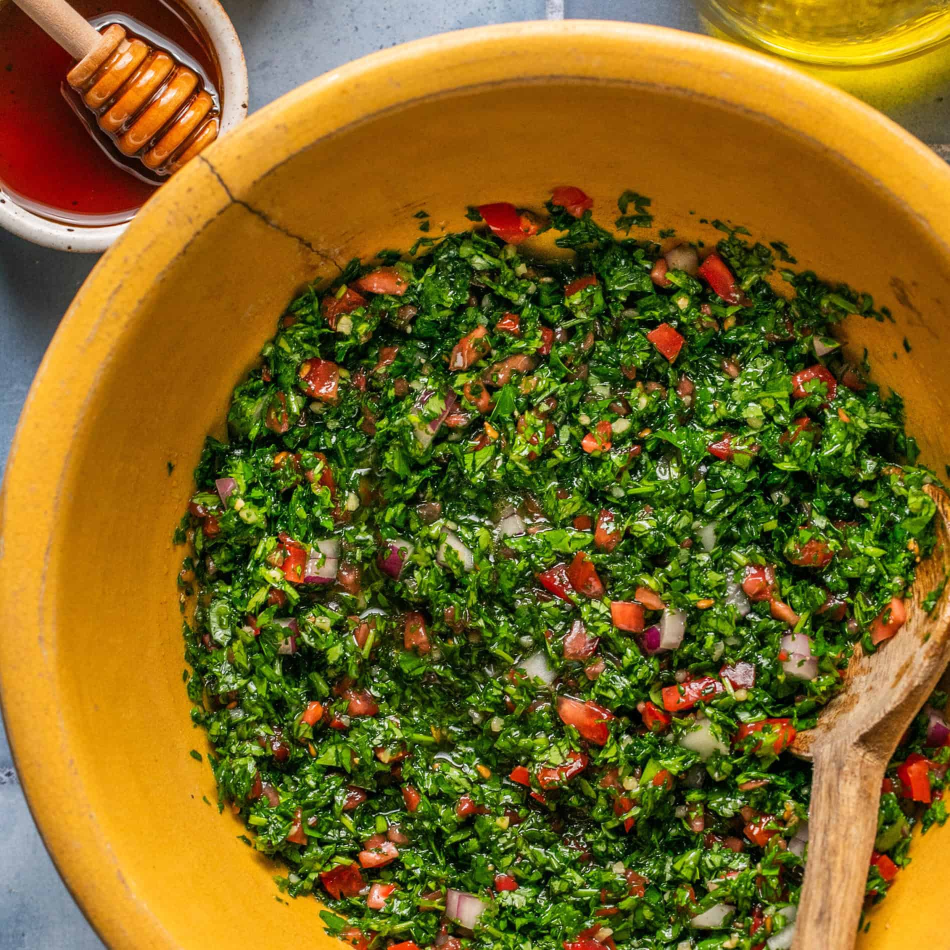 Chimichurri sauce in a large mixing bowl.