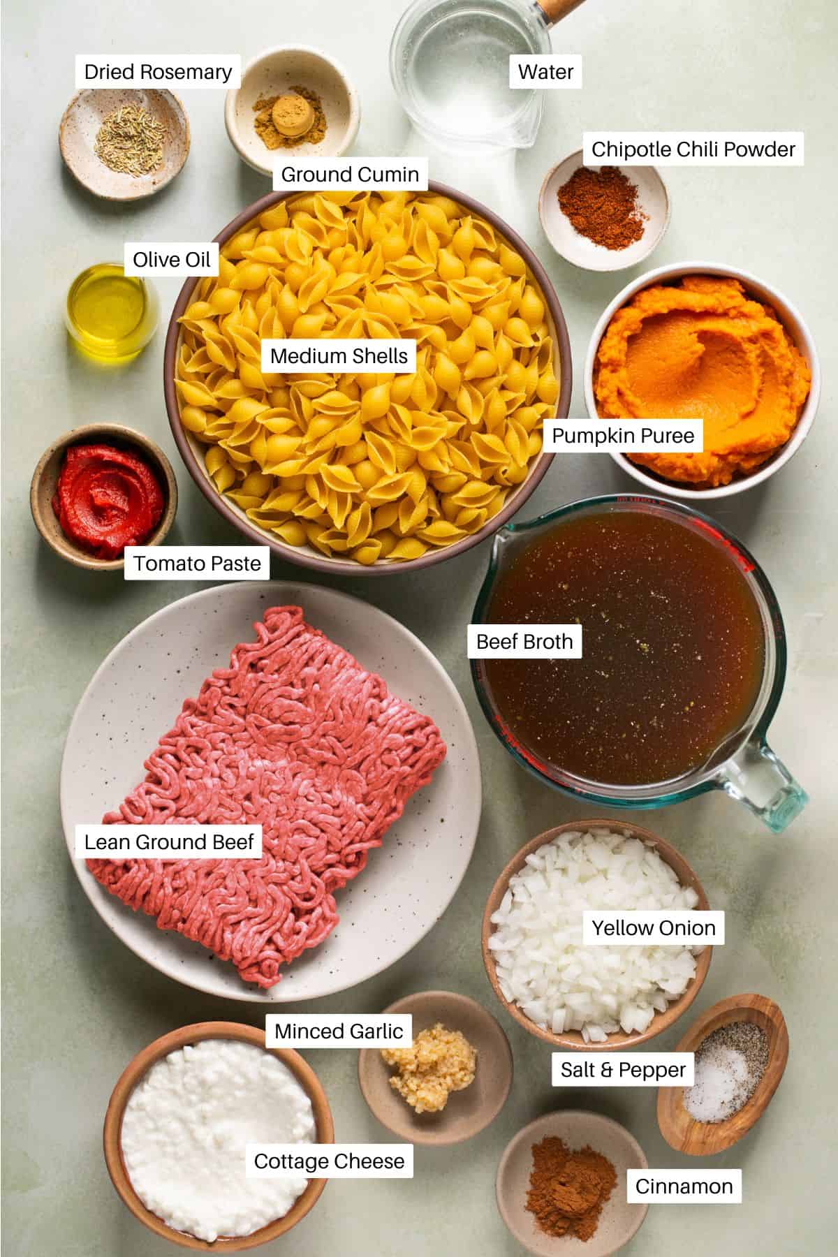 Medium shell pasta, water, cumin, rosemary, olive oil, tomato paste, pumpkin puree, beef broth, ground beef, onion, garlic, cottage cheese, cinnamon, salt and pepper for making pasta. 