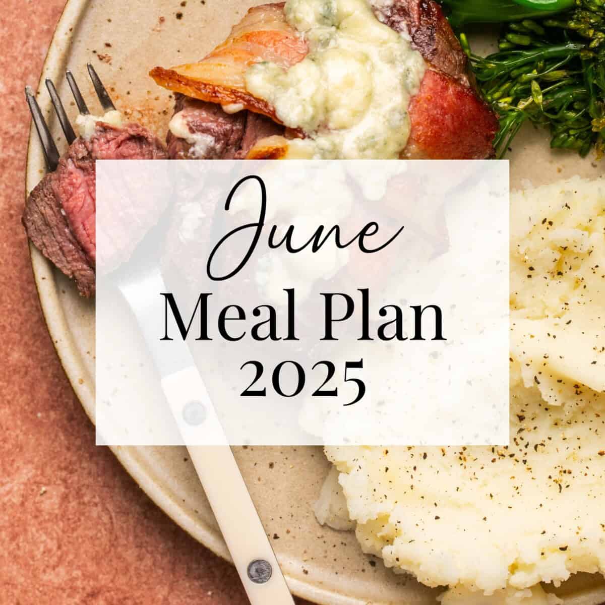 A plate of mashed potatoes with pepper, steak topped with melted cheese and bacon, broccolini, and a fork. Overlaid text reads: June Meal Plan 2025.