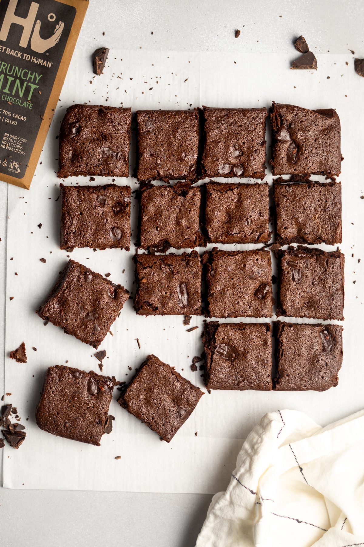 Crunchy mint chocolate brownies on parchment paper.