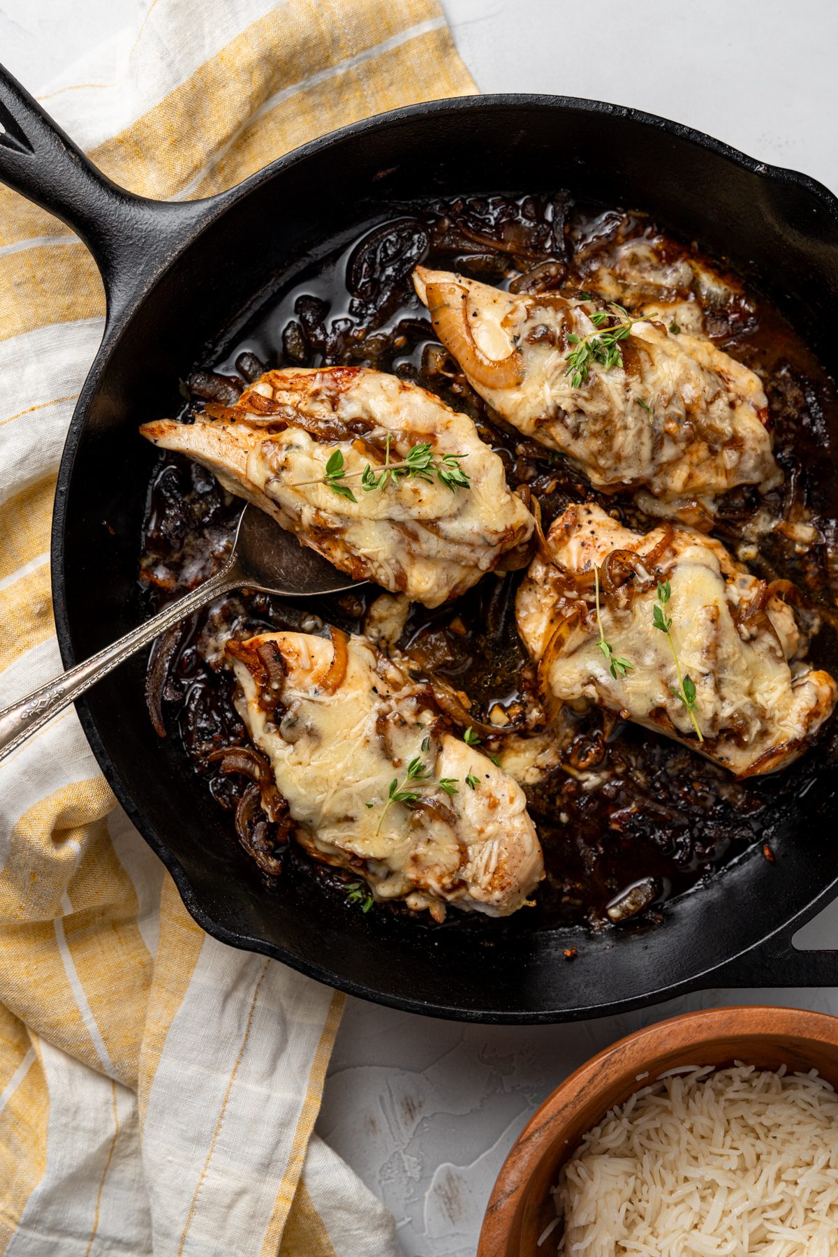 Skillet full of French onion chicken.