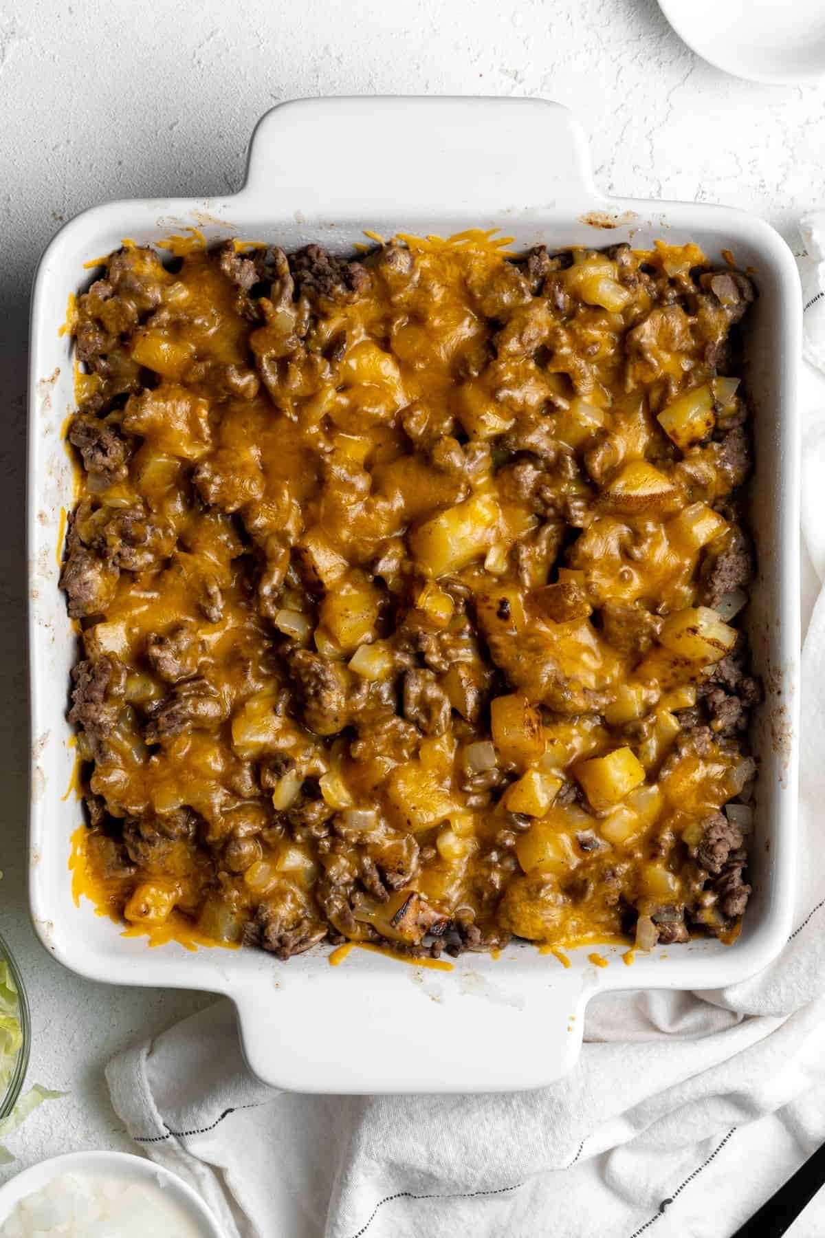 Big mac casserole topped with melted cheese.